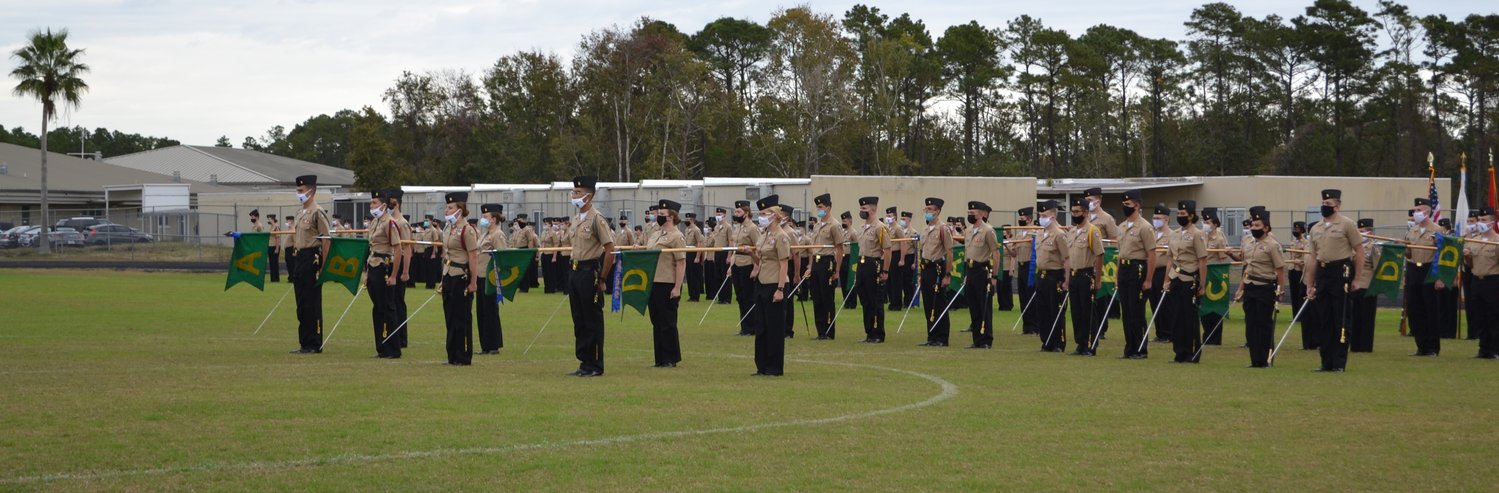 Nease NJROTC’s cadet leadership marches on during its annual military inspection.